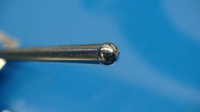  balled tungsten caused by a low balance setting (excess EP)